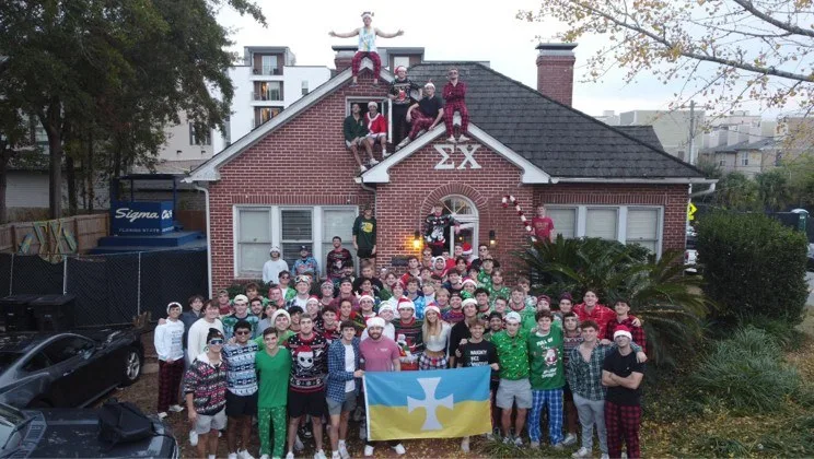 Brothers gathered at a chapter Christmas event